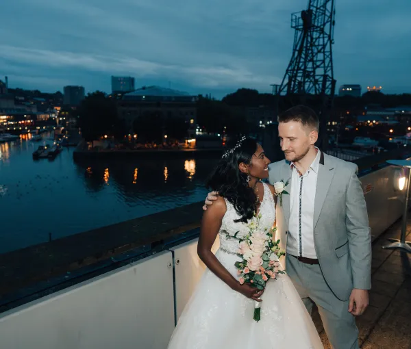 M Shed Wedding Couple Outside on Balcony
